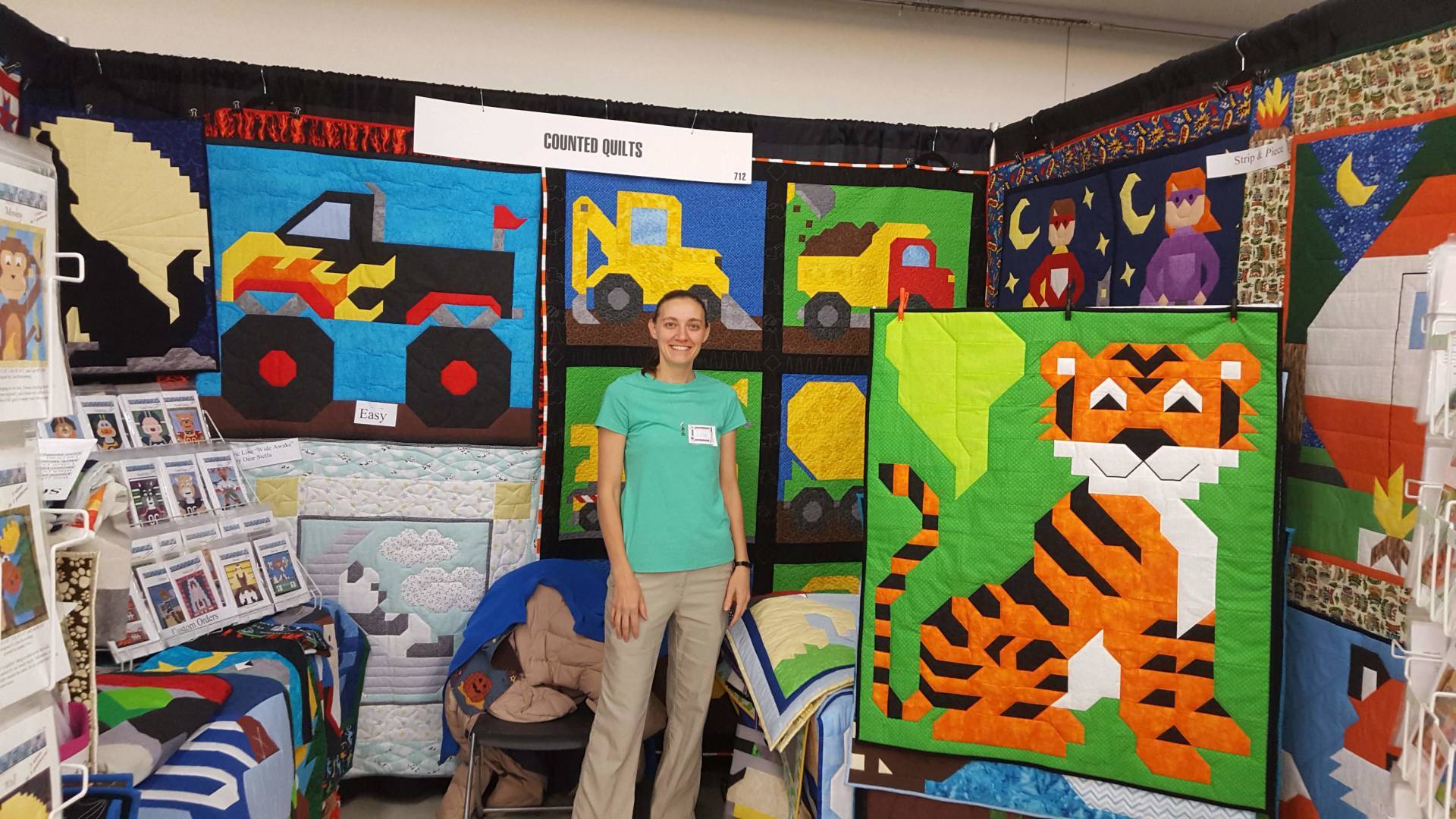 designer, Lisa Muilenburg,  in show booth