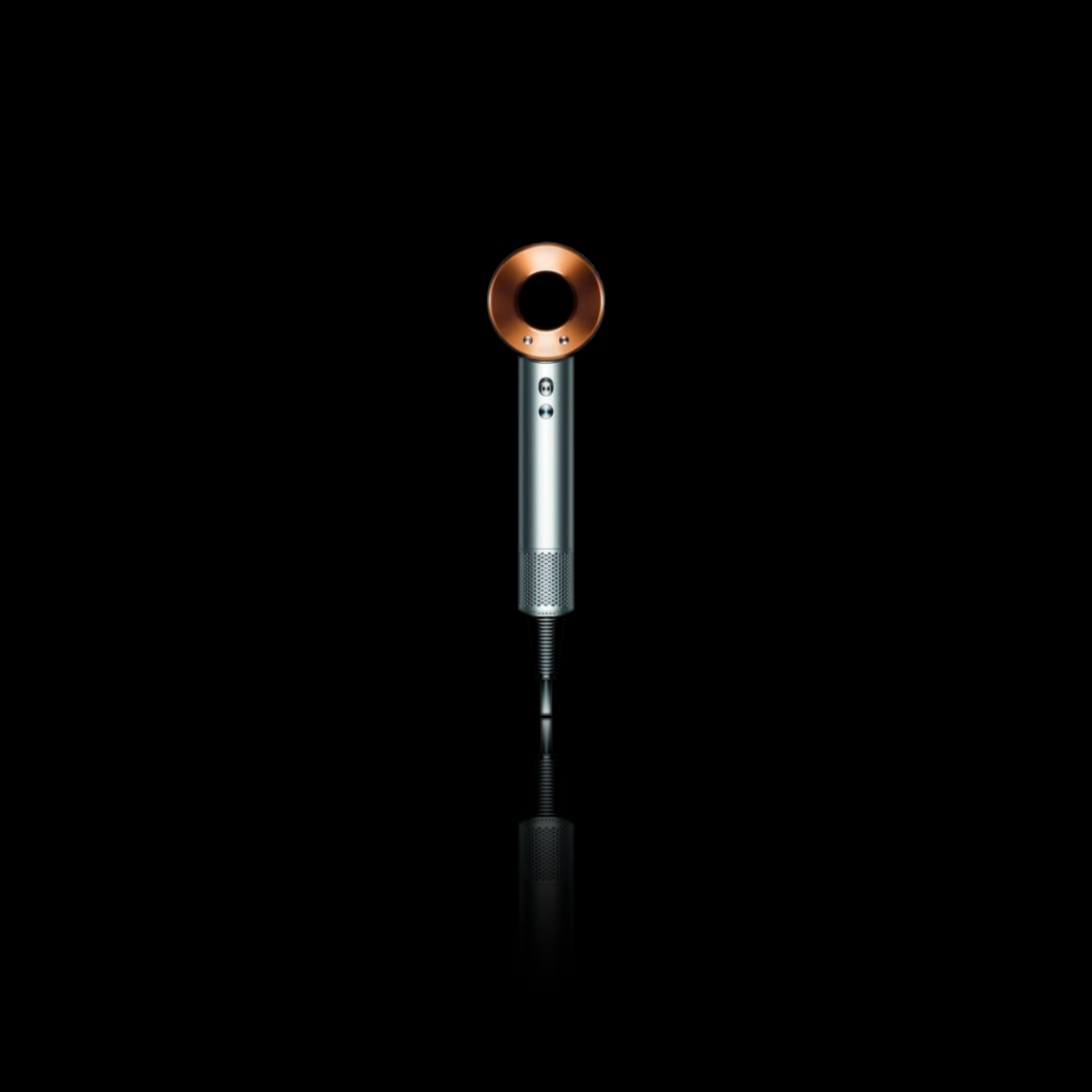 Dyson’s Supersonic: The revolutionary hair dryer is the only visible object in a pitch black room.
