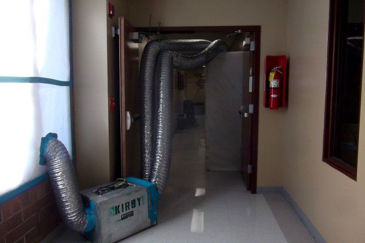 School Hallway With A Ventilation System Pumping Through Pipes the Halls