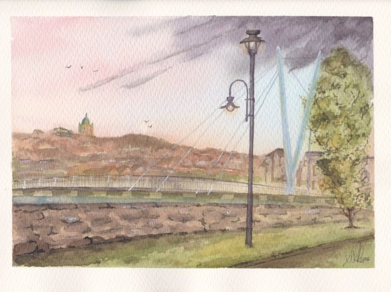 lancaster from the quay in a loose watercolour style. in this painting you can see the ashton memorial in the distance and greyhound bridge and the millennium bridge closer in the foreground
