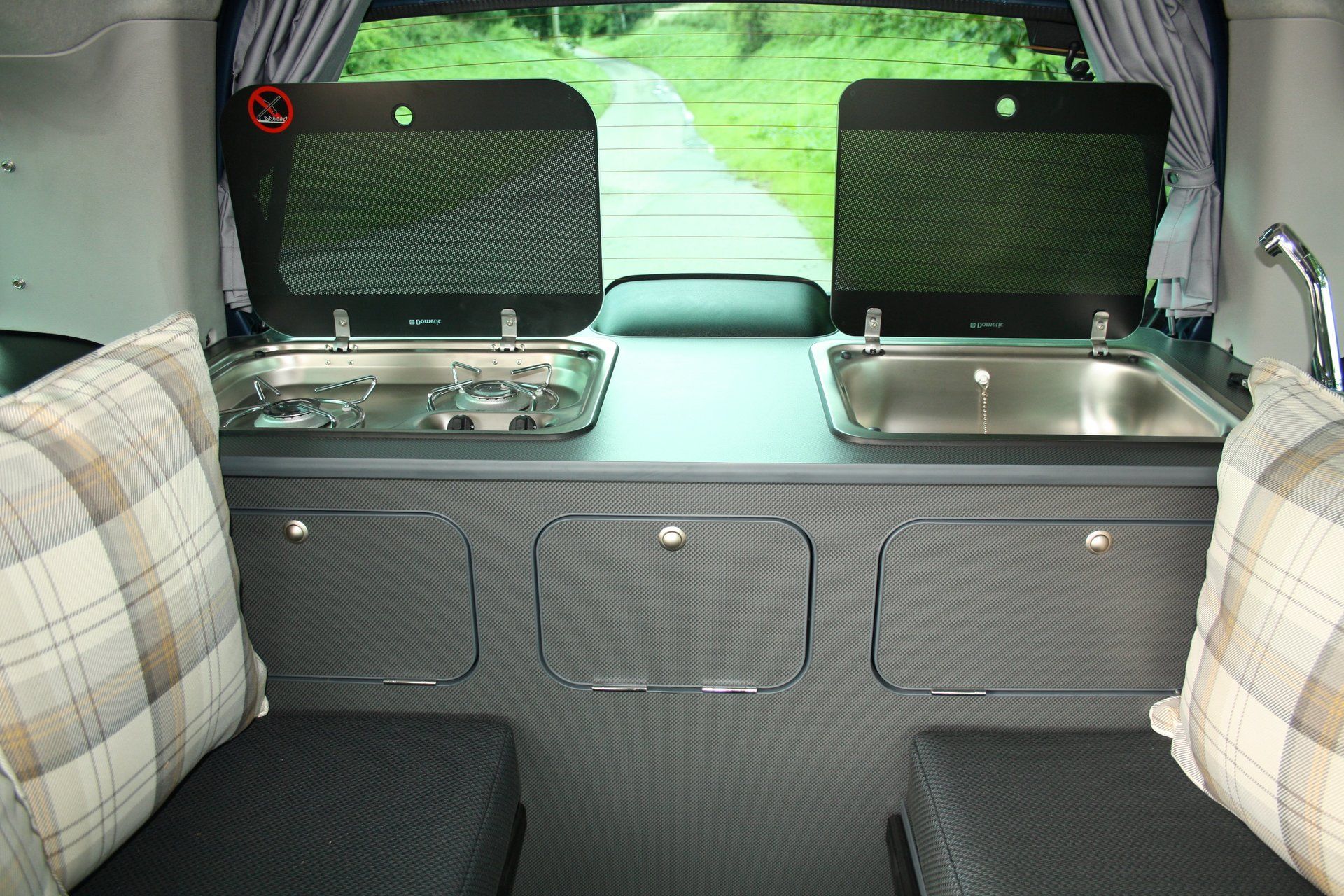 Cooker and sink unit inside converted Berlingo by Chapel Motorhomes