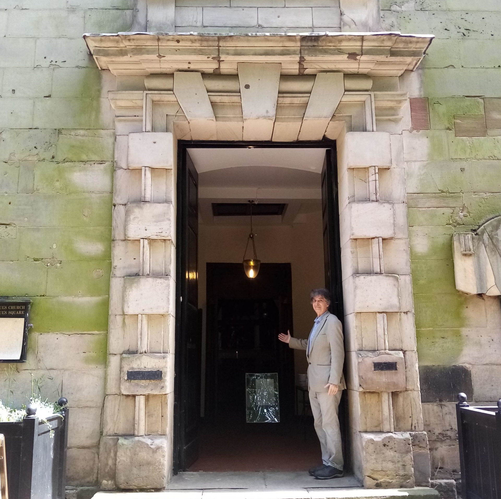 A man standing in a doorway