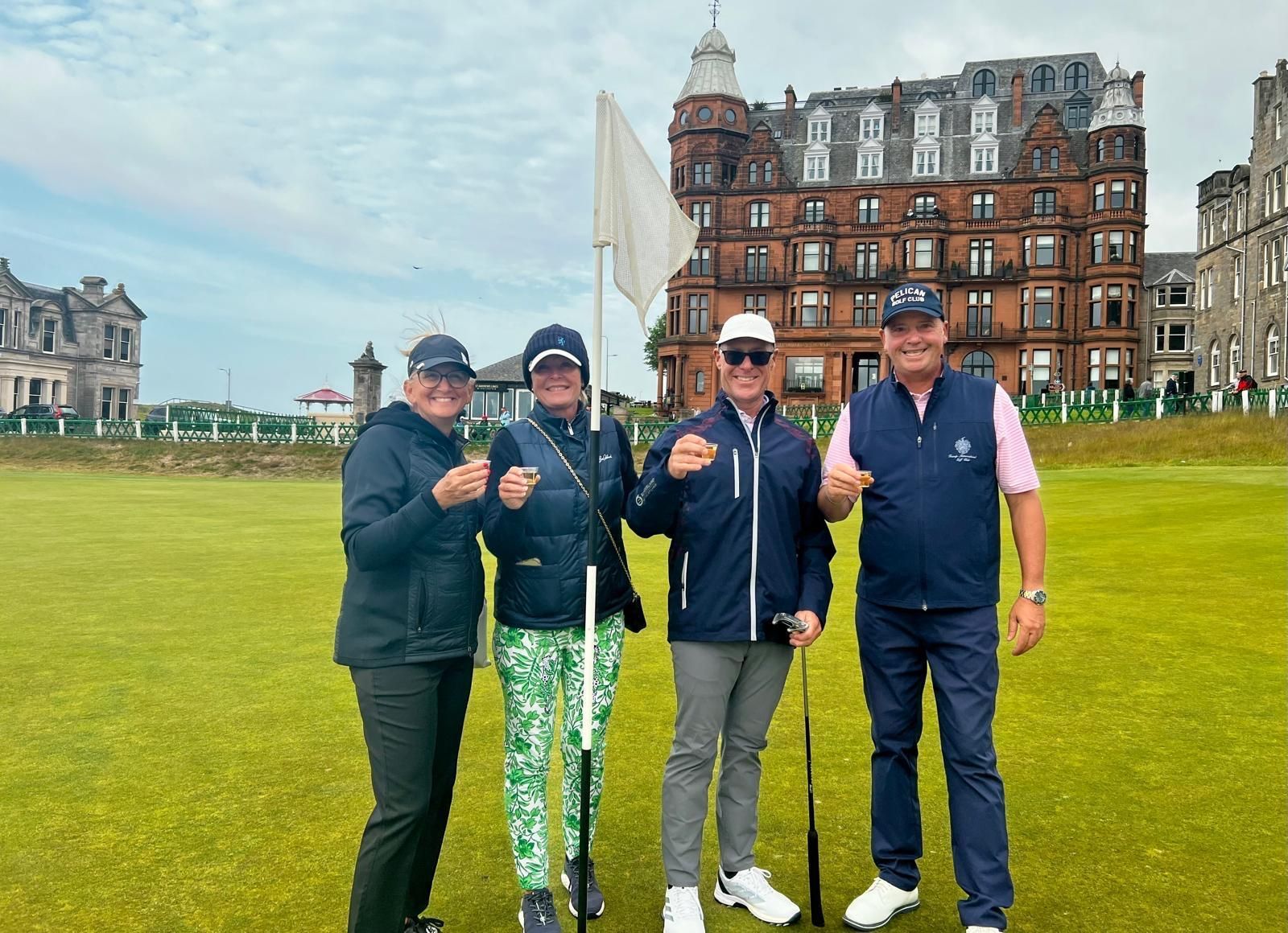 Scenic St Andrews golf course with ocean views, Swilcan Bridge, and historic clubhouse for ultimate