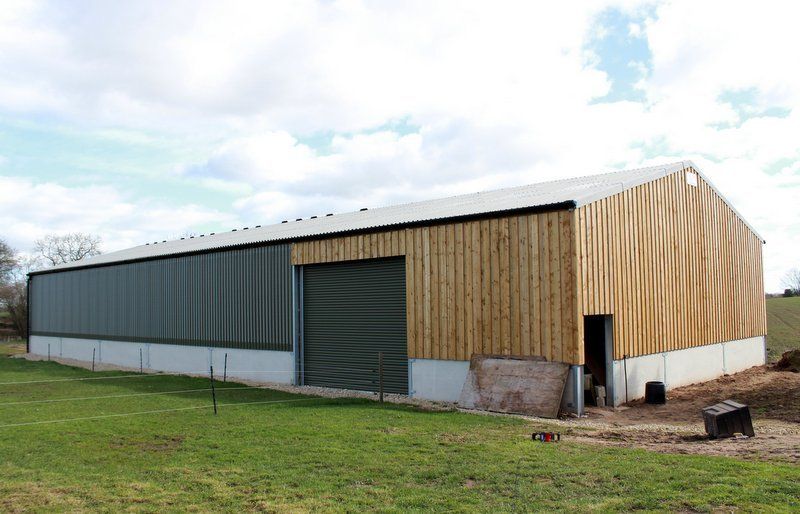 Farm building with metal roof