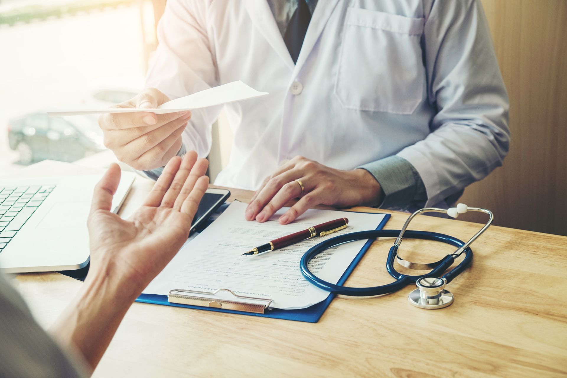 a doctor giving a prescription