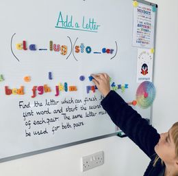 11 Plus Tutoring for Exams Tutor pupil and whiteboard