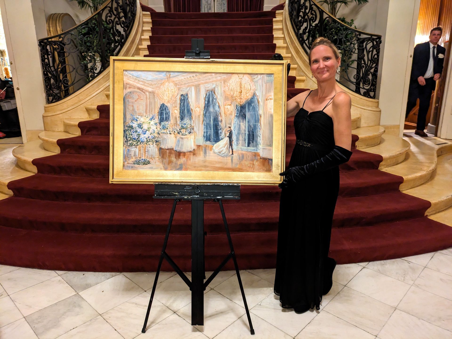 Local artist Bethany Browne with her finished and framed painting, at Rosecliff Mansion in Newport, CT.