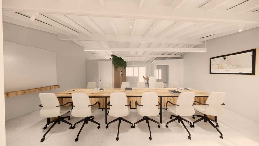 Área de reuniones y formación en local inmobiliaria