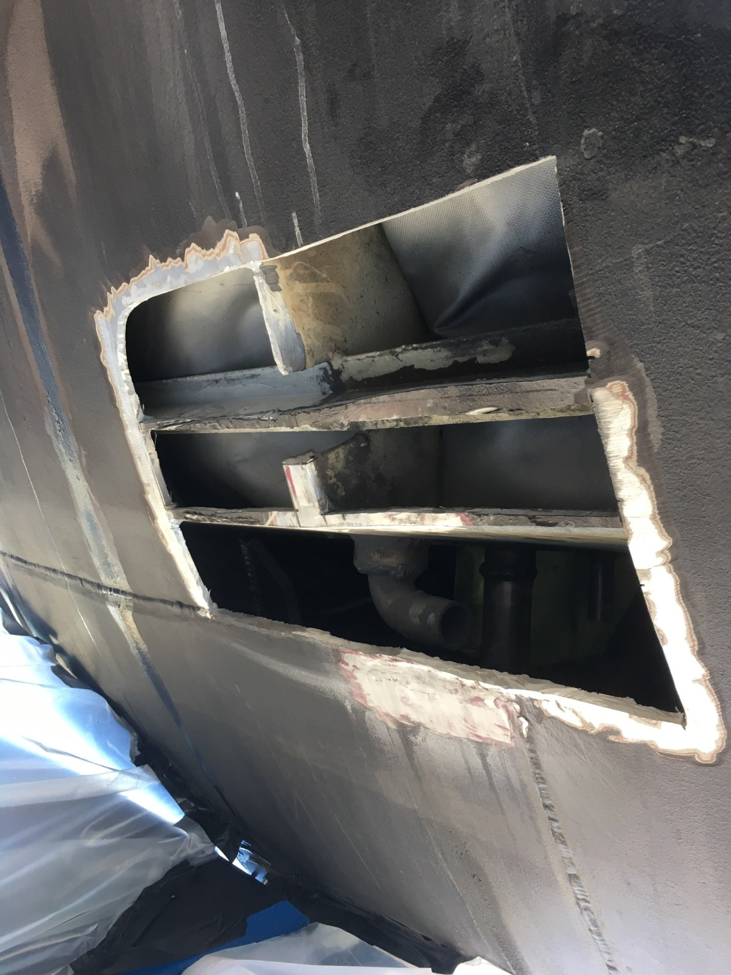 Corroded hull plates prepared ready for new