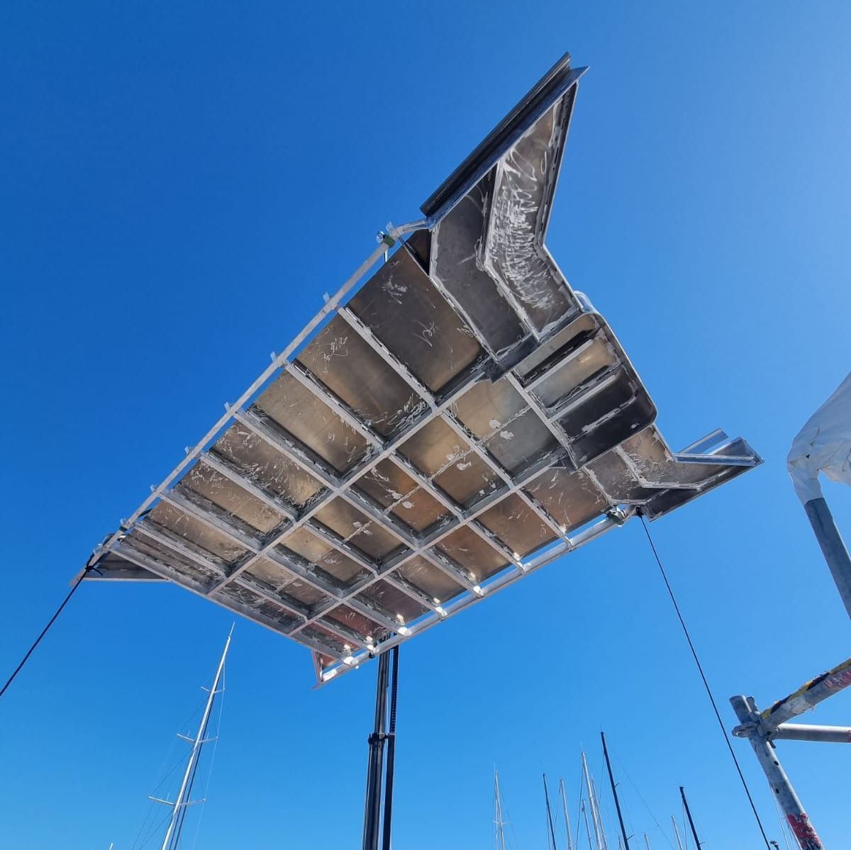 Deck sections being lifted into place