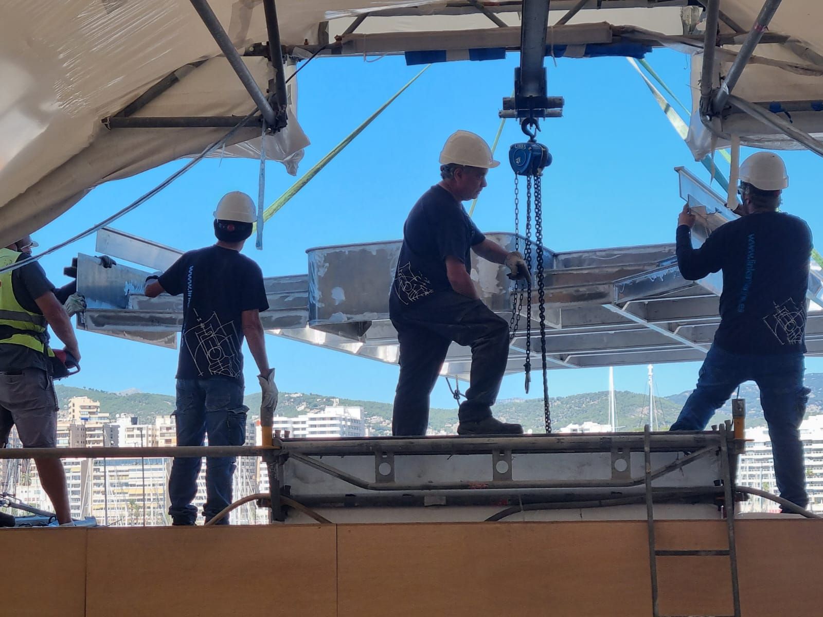 Moving sundeck into place on board