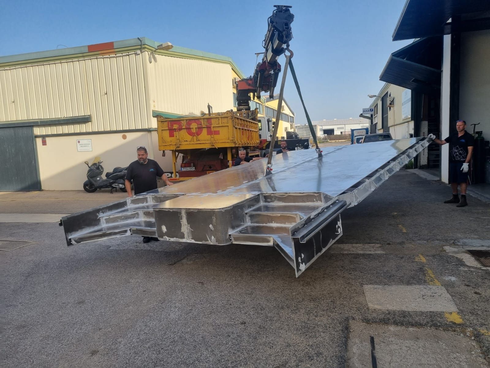 Fabricated sundeck trip from workshop to boat