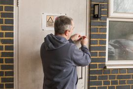RLM Locksmiths getting a commercial door opened