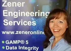 Zener Engineering Services Office Manager Stood in Front of Banner