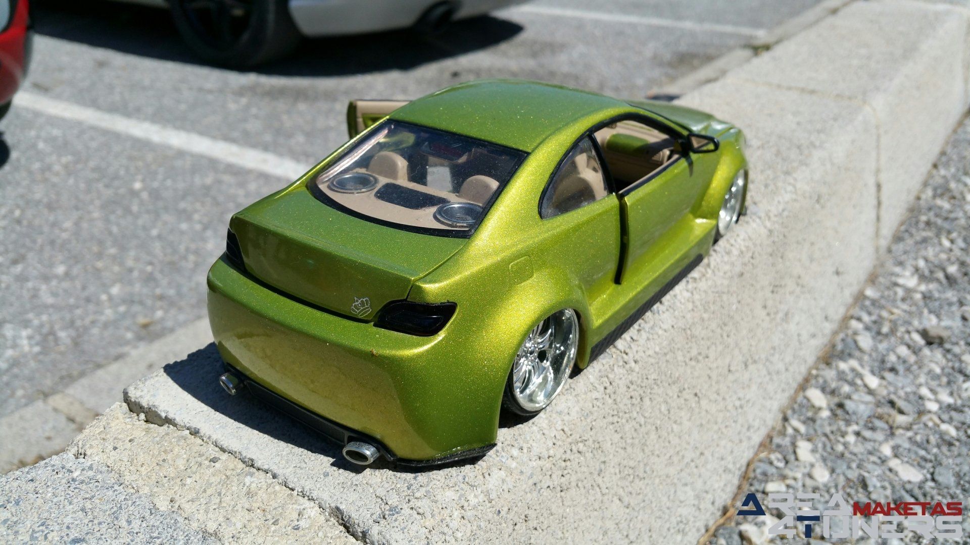 Reportaje maqueta Tuning Peugeot 406 Coupé The Circus Imagen perteneciente al reportaje fotográfico de la revista Tuning de publicación diaria Area4tuners.es sobre una maqueta Tuning de escala 1:18 Peugeot 406 Coupé