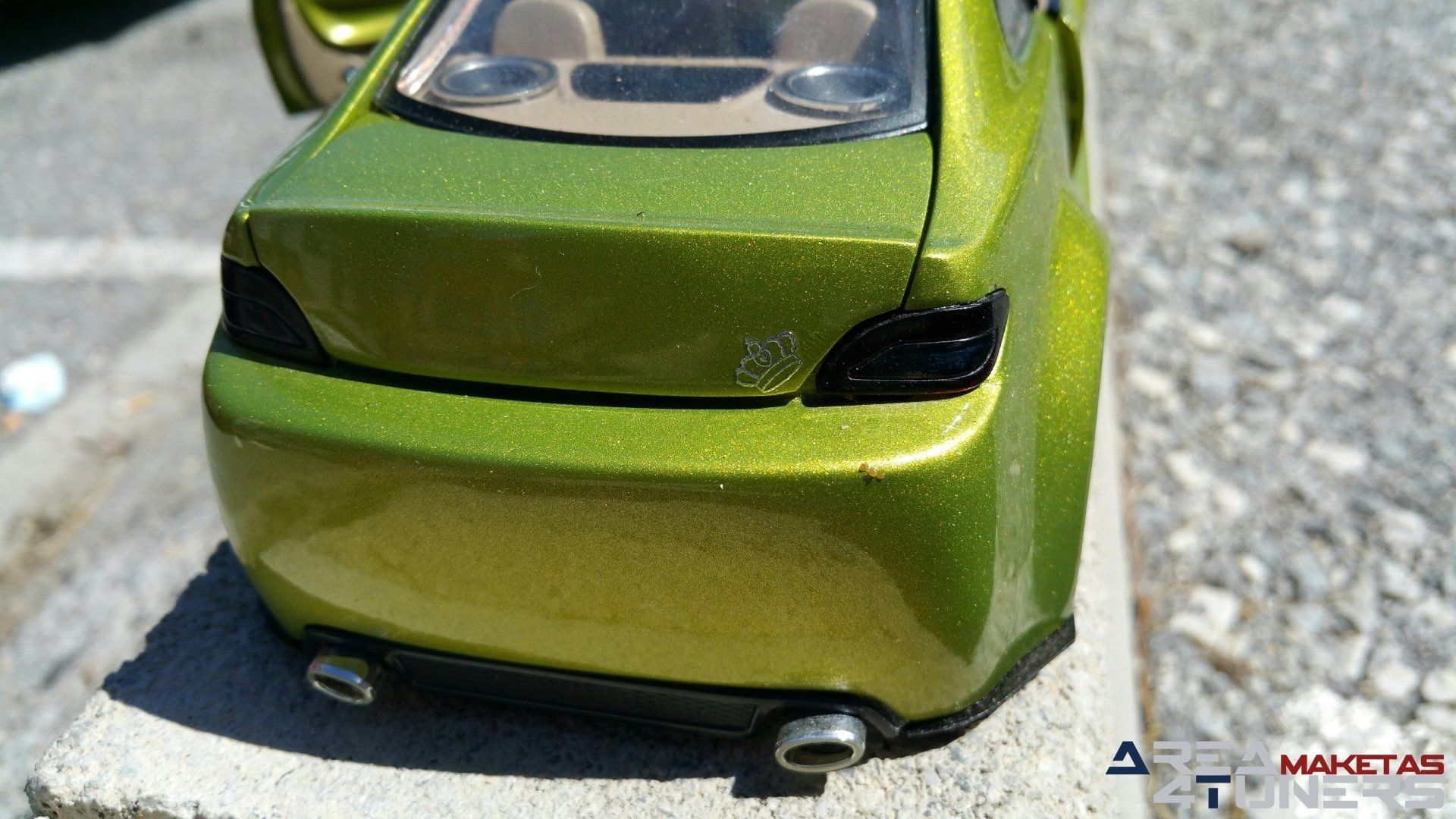 Reportaje maqueta Tuning Peugeot 406 Coupé The Circus Imagen perteneciente al reportaje fotográfico de la revista Tuning de publicación diaria Area4tuners.es sobre una maqueta Tuning de escala 1:18 Peugeot 406 Coupé