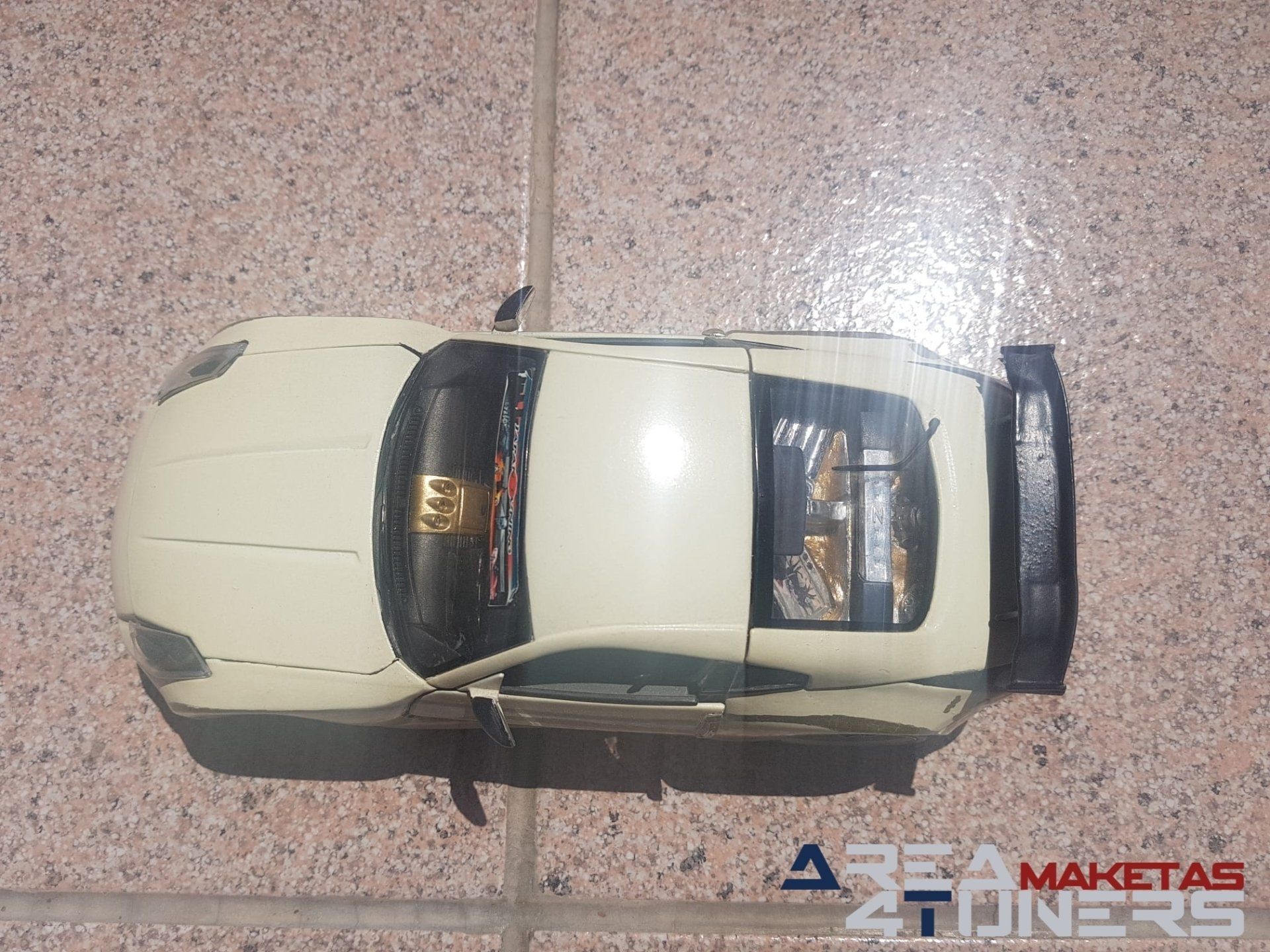 Reportaje maqueta Tuning Nissan 350z Golden Drift Imagen perteneciente al reportaje fotográfico de la revista Tuning de publicación diaria Area4tuners.es sobre una maqueta Tuning de escala 1:18 Nissan 350z