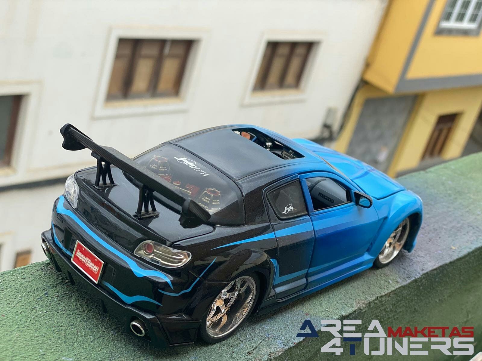 Reportaje maqueta Tuning Mazda RX-8 Tokyo Look Imagen perteneciente al reportaje fotográfico de la revista Tuning de publicación diaria Area4tuners.es sobre una maqueta Tuning de escala 1:18 Mazda Rx-8