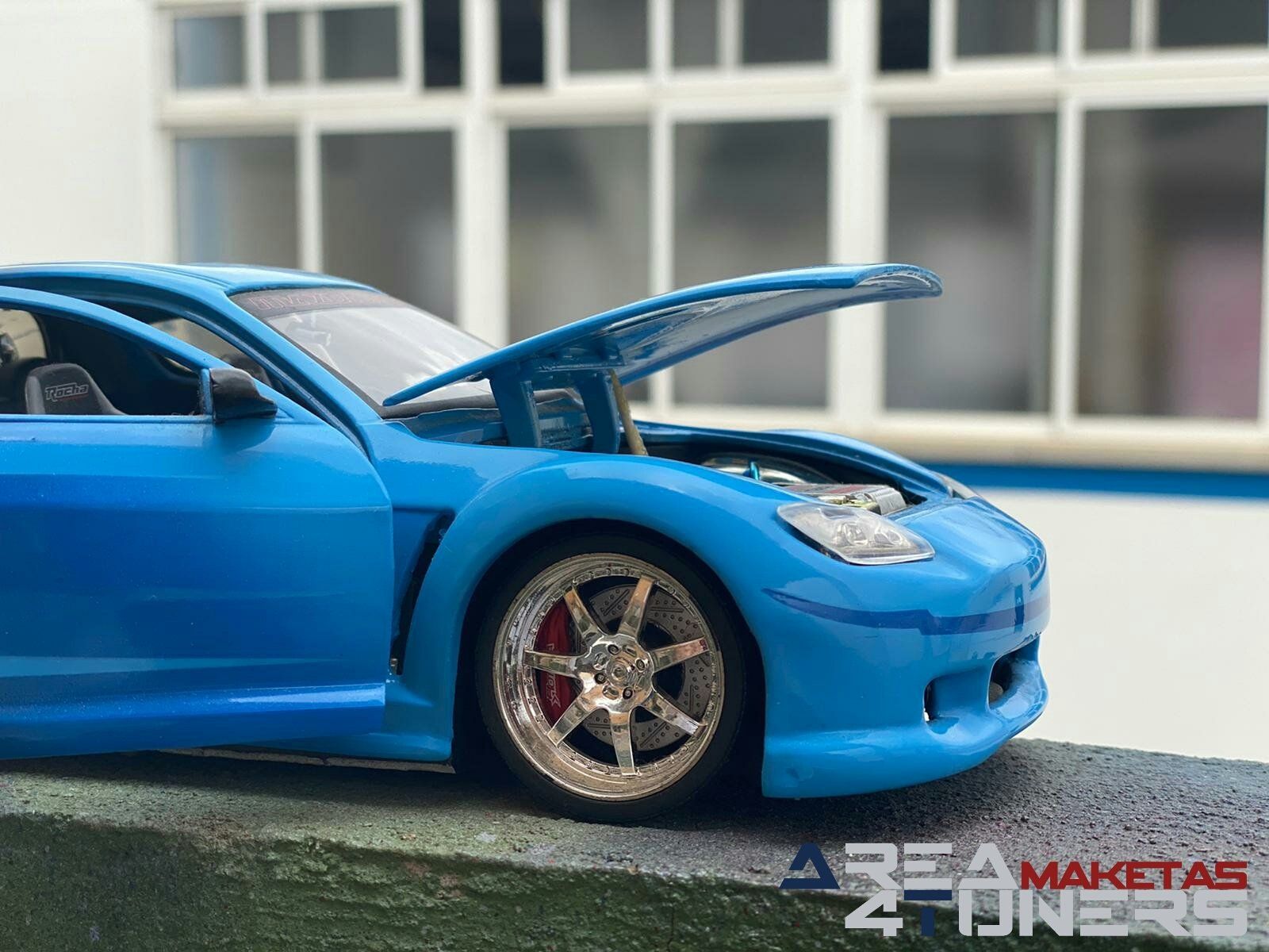 Reportaje maqueta Tuning Mazda RX-8 Tokyo Look Imagen perteneciente al reportaje fotográfico de la revista Tuning de publicación diaria Area4tuners.es sobre una maqueta Tuning de escala 1:18 Mazda Rx-8