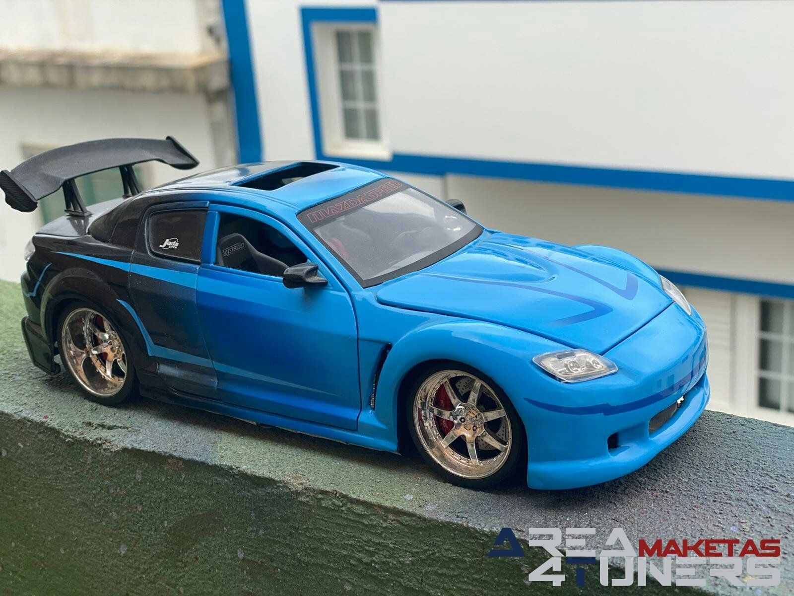 Reportaje maqueta Tuning Mazda RX-8 Tokyo Look Imagen perteneciente al reportaje fotográfico de la revista Tuning de publicación diaria Area4tuners.es sobre una maqueta Tuning de escala 1:18 Mazda Rx-8