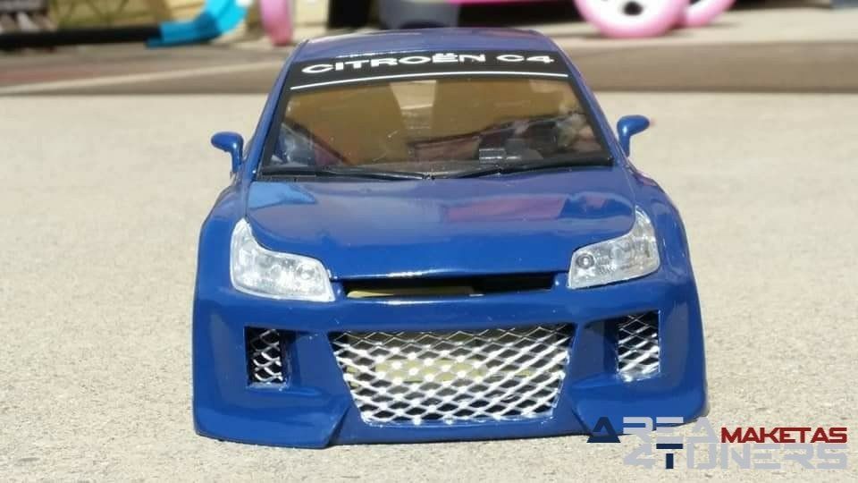 Reportaje maqueta Tuning Citroën C4 Kustomorphorse Imagen perteneciente al reportaje fotográfico de la revista Tuning de publicación diaria Area4tuners.es sobre una maqueta Tuning de escala 1:18 Citroën C4