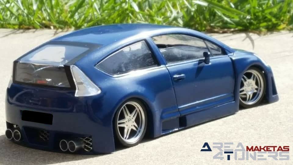 Reportaje maqueta Tuning Citroën C4 Kustomorphorse Imagen perteneciente al reportaje fotográfico de la revista Tuning de publicación diaria Area4tuners.es sobre una maqueta Tuning de escala 1:18 Citroën C4