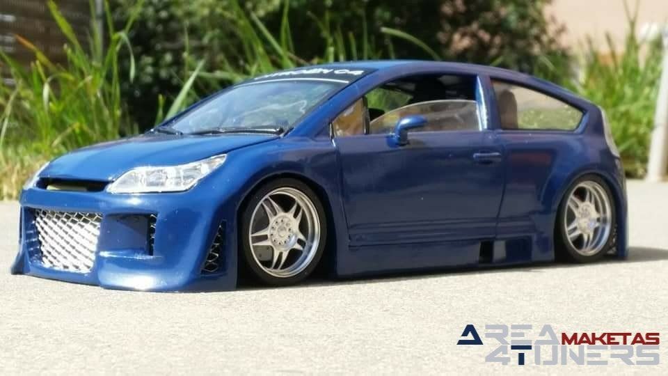 Reportaje maqueta Tuning Citroën C4 Kustomorphorse Imagen perteneciente al reportaje fotográfico de la revista Tuning de publicación diaria Area4tuners.es sobre una maqueta Tuning de escala 1:18 Citroën C4