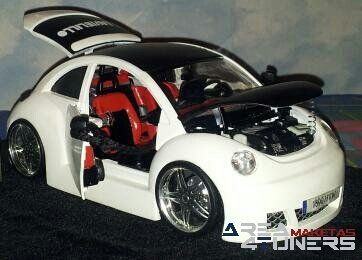 Reportaje maqueta Tuning Vw New Beetle Suicidal Doors Imagen perteneciente al reportaje fotográfico de la revista Tuning de publicación diaria Area4tuners.es sobre una maqueta Tuning de escala 1:24 Vw New Beetle