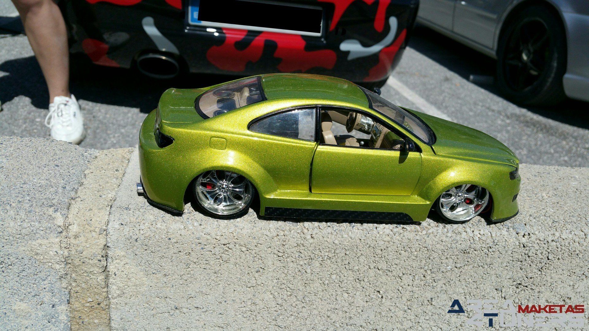 Reportaje maqueta Tuning Peugeot 406 Coupé The Circus Imagen perteneciente al reportaje fotográfico de la revista Tuning de publicación diaria Area4tuners.es sobre una maqueta Tuning de escala 1:18 Peugeot 406 Coupé