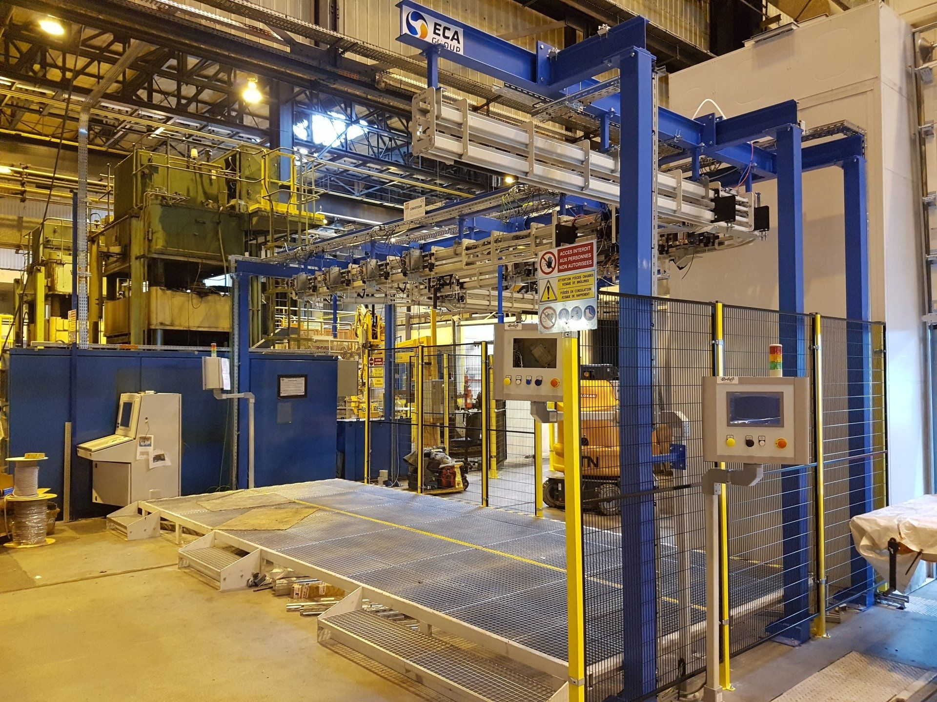 Transfert automatique des charges par convoyeur bi-rail