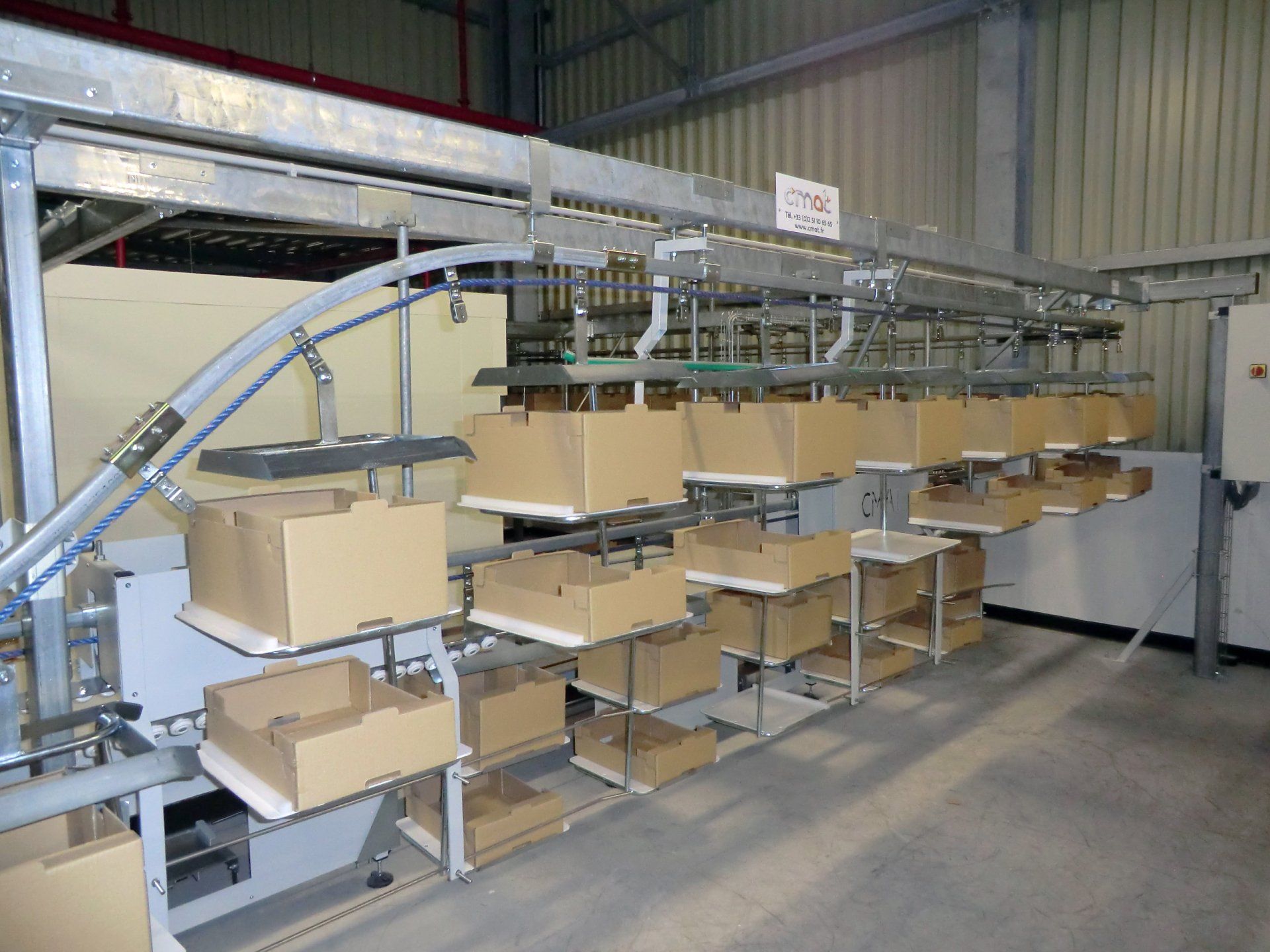 Convoyeur agroalimentaire avec chargement automatique des balancelles