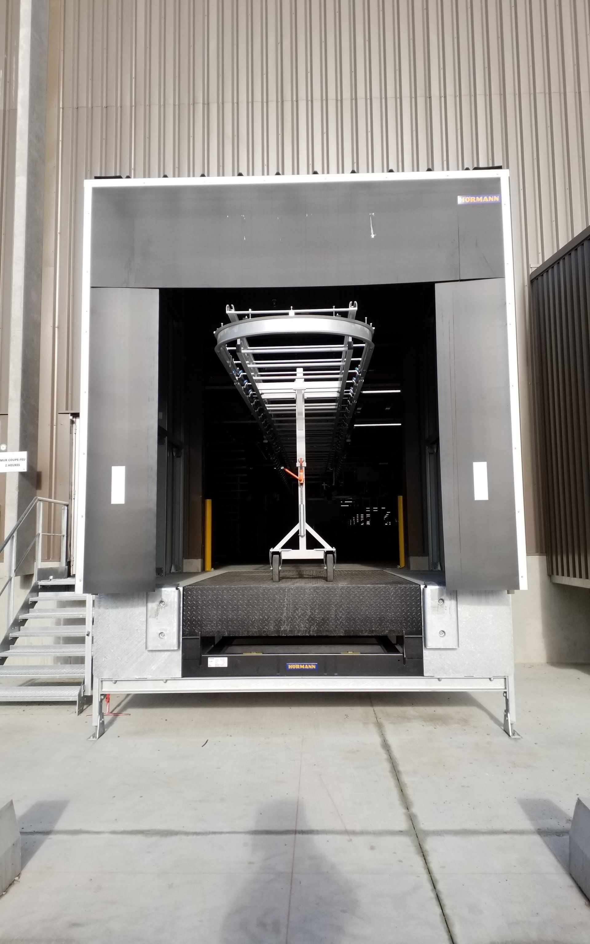 Convoyeur blanchisserie télescope de chargement camion pour trolley sur barre