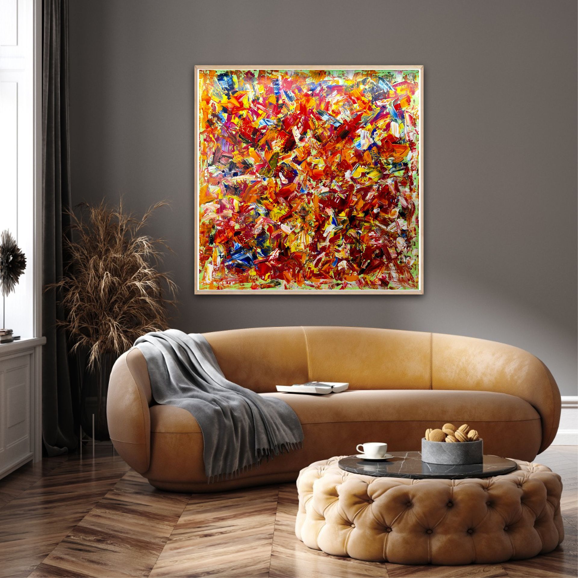 multicolored painting in interior with sofa