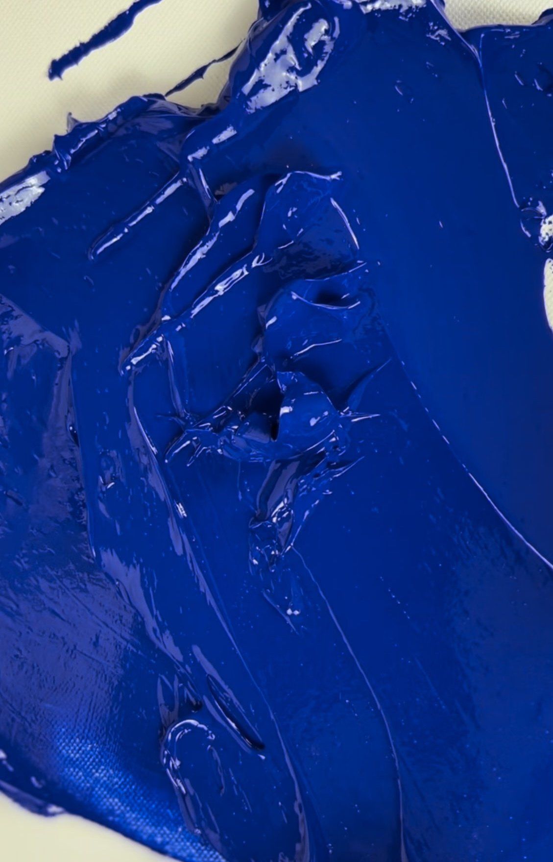 blue paint on canvas