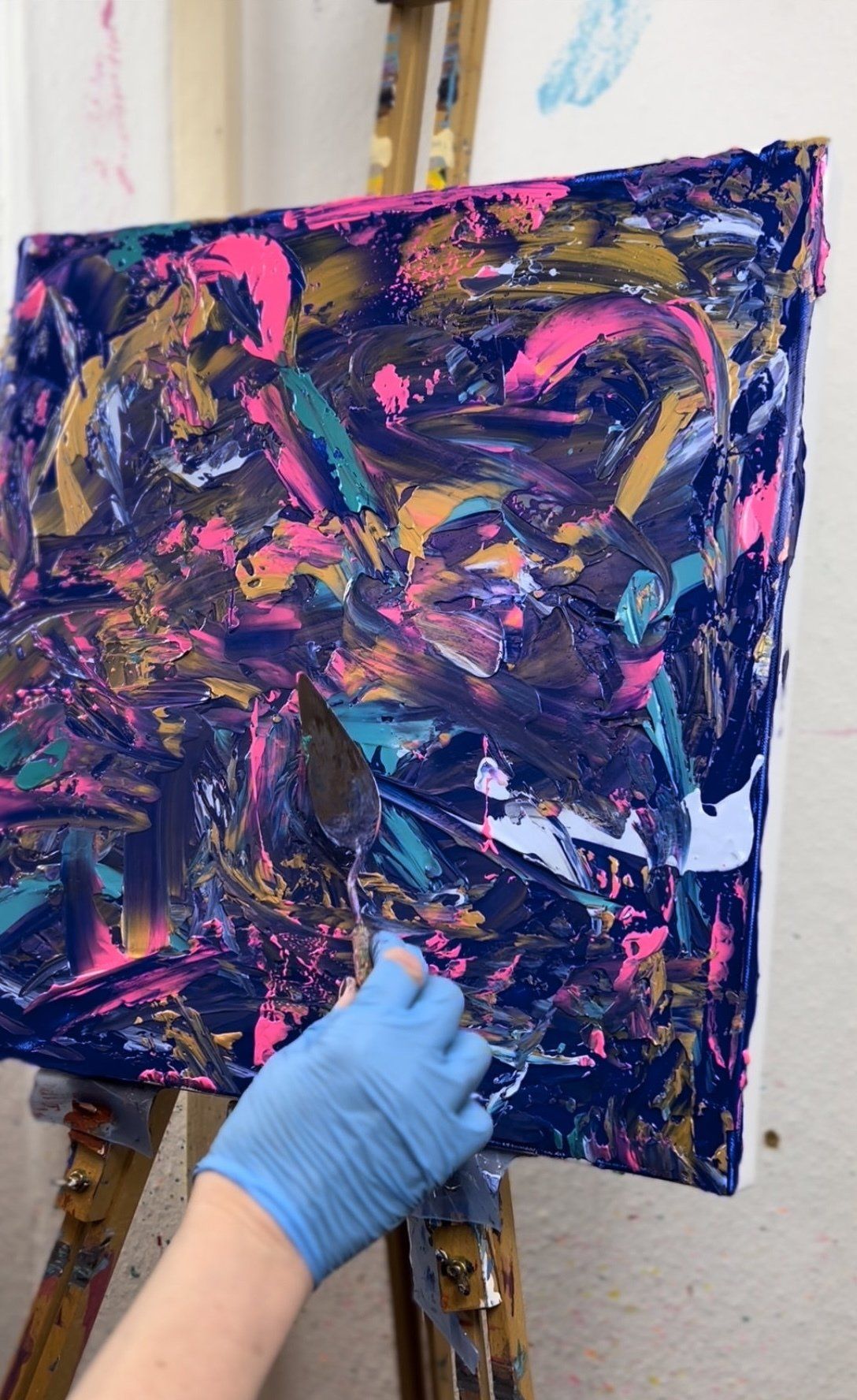 detail of blue, gold and pink painting