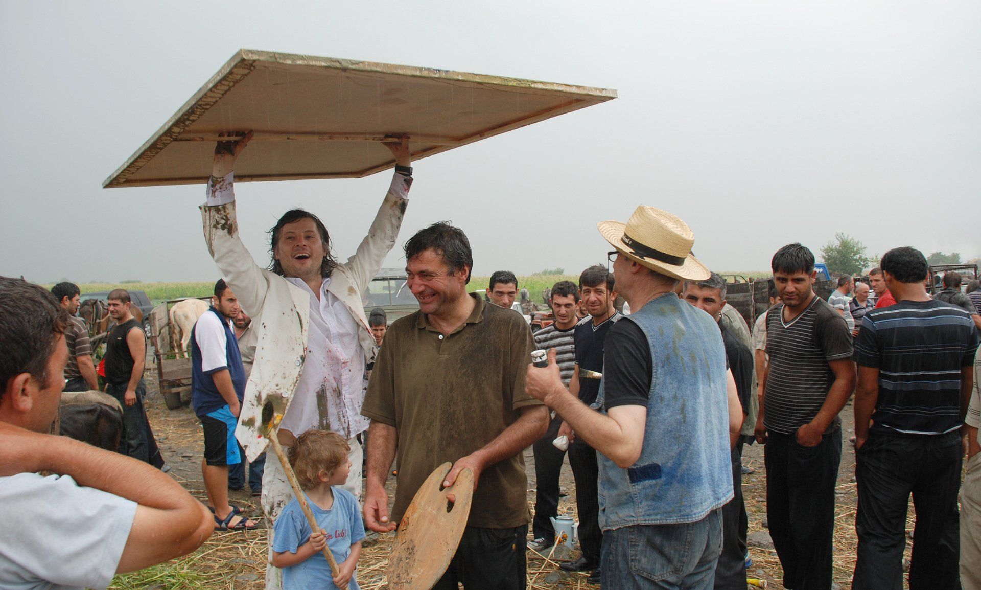 Sebastian Bieniek performance at the cattle market in Pona, Georgia, 2011. Sebastian Bieniek performance at the cattle market in Pona, Georgia, 2011.