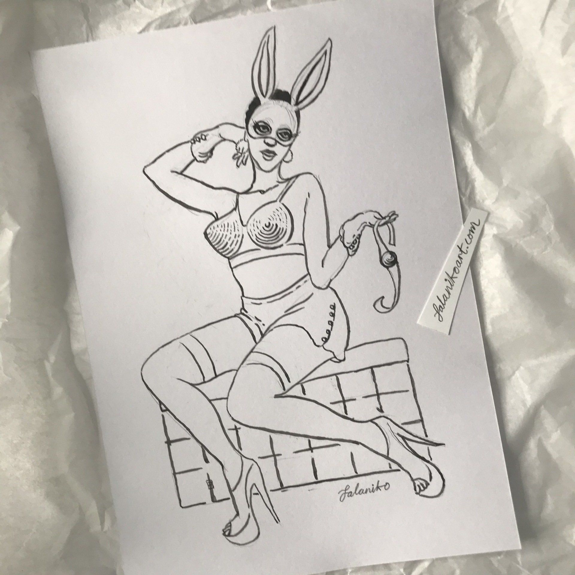 A quirky ink drawing of a black woman wearing a rabbit mask, retro-style satin cone bra, high-waisted knickers and stripper heels holding handcuffs, whilst sitting on a cage