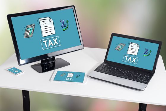 Accounting Services Image of devices with word tax.