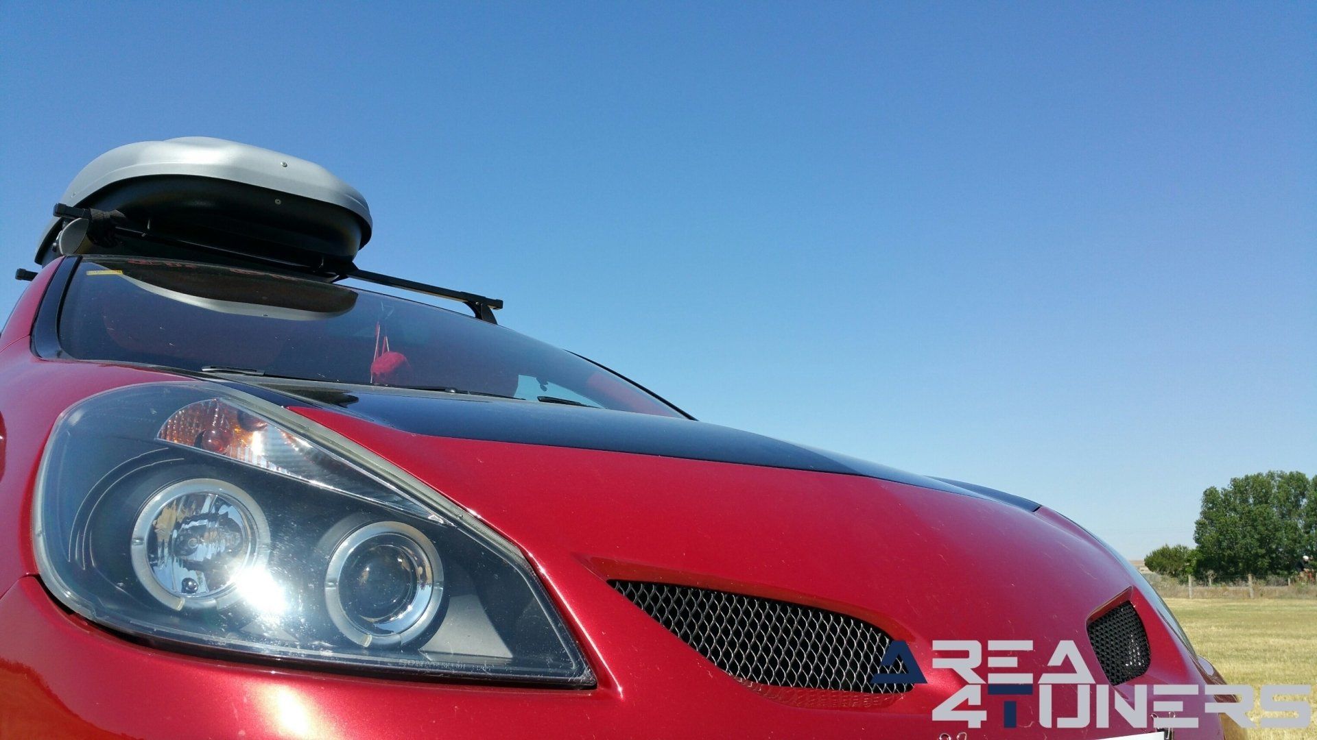 Imagen reportaje coche Tuning Renault Clio Devil Little Imagen perteneciente al reportaje fotográfico de la revista Tuning de publicación diaria Area4tuners.es sobre un Renault Clio