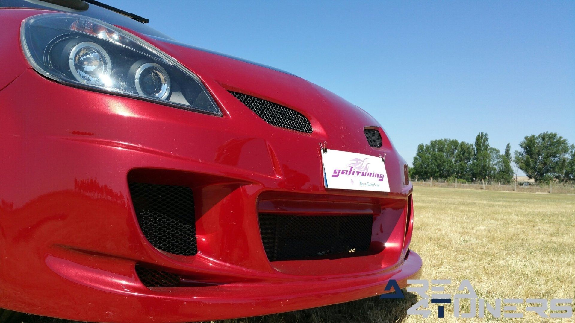 Imagen reportaje coche Tuning Renault Clio Devil Little Imagen perteneciente al reportaje fotográfico de la revista Tuning de publicación diaria Area4tuners.es sobre un Renault Clio