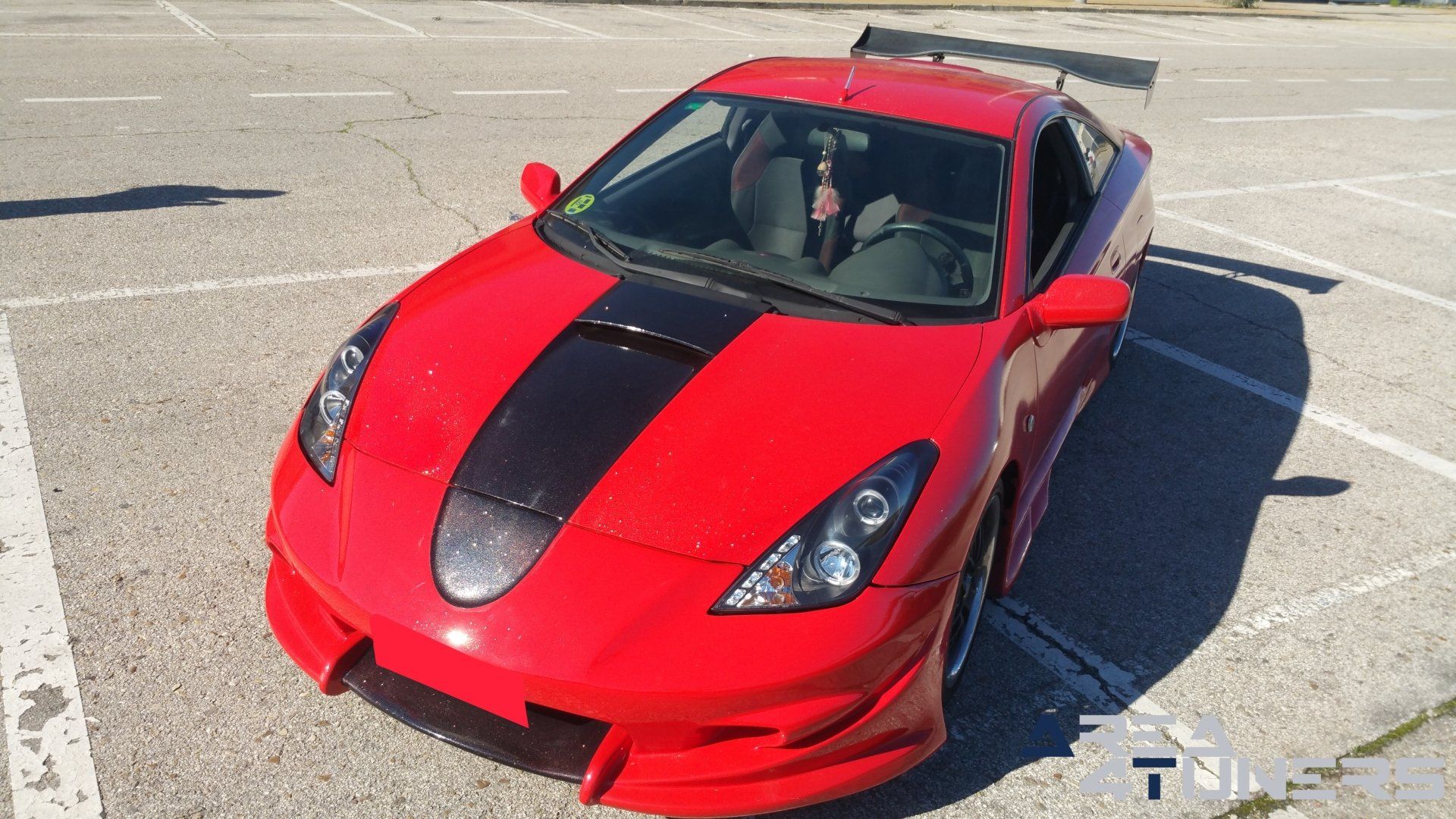 Imagen reportaje coche Tuning Toyota Celica Hemoglobine Imagen perteneciente al reportaje fotográfico de la revista Tuning de publicación diaria Area4tuners.es sobre un Toyota Celica