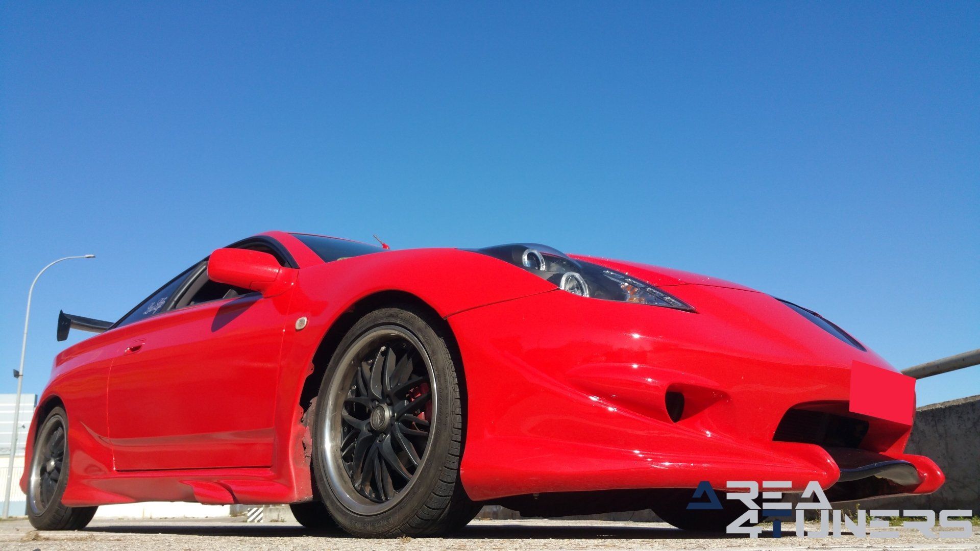 Imagen reportaje coche Tuning Toyota Celica Hemoglobine Imagen perteneciente al reportaje fotográfico de la revista Tuning de publicación diaria Area4tuners.es sobre un Toyota Celica