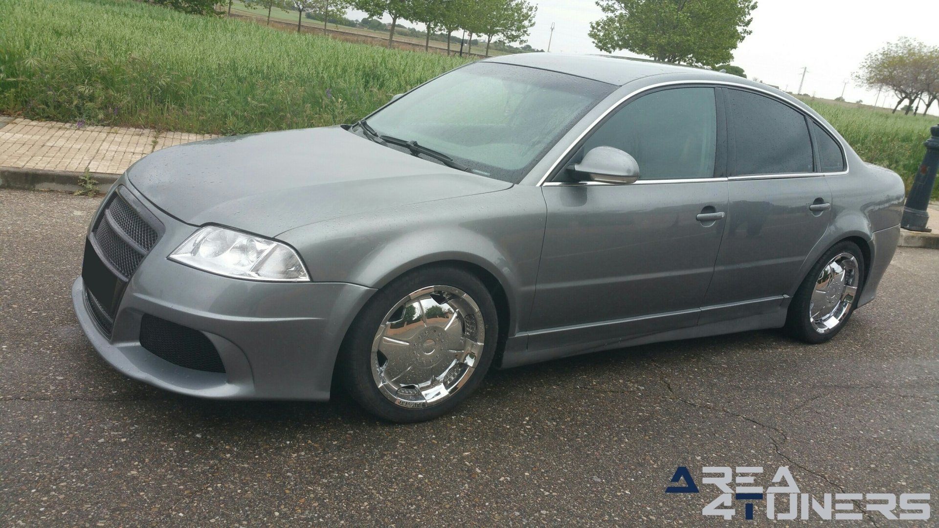 Imagen reportaje coche Tuning Vw Passat Madurez Imagen perteneciente al reportaje fotográfico de la revista Tuning de publicación diaria Area4tuners.es sobre un Vw Passat