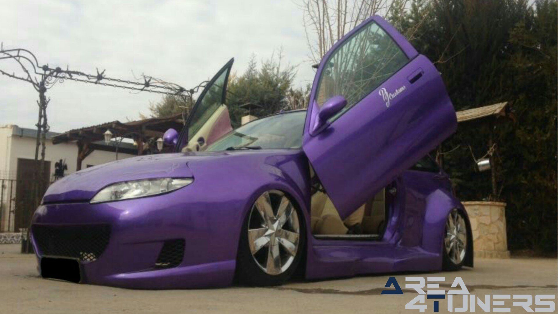 Imagen reportaje coche Tuning Mg Zr Curvas Infinitas Imagen perteneciente al reportaje de coche Tuning, de la revista Area4tuners.es sobre un Mg Zr
