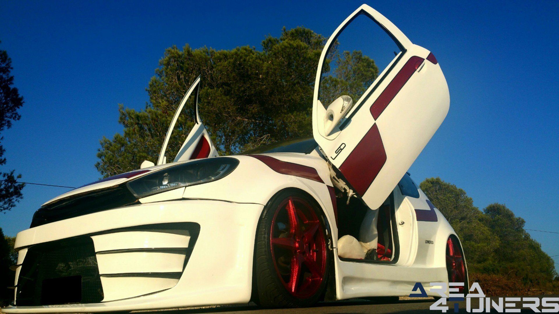 Imagen reportaje coche Tuning Peugeot 206 Doscirocco Imagen perteneciente al reportaje de coche Tuning, de la revista Area4tuners.es sobre un Peugeot 206