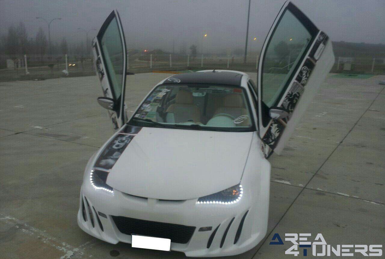 Imagen reportaje coche Tuning Mg Zr Sin City Imagen perteneciente al reportaje de coche Tuning, de la revista Area4tuners.es sobre un Mg Zr