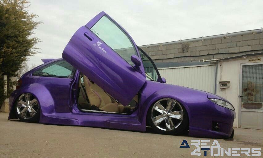 Imagen reportaje coche Tuning Mg Zr Curvas Infinitas Imagen perteneciente al reportaje de coche Tuning, de la revista Area4tuners.es sobre un Mg Zr