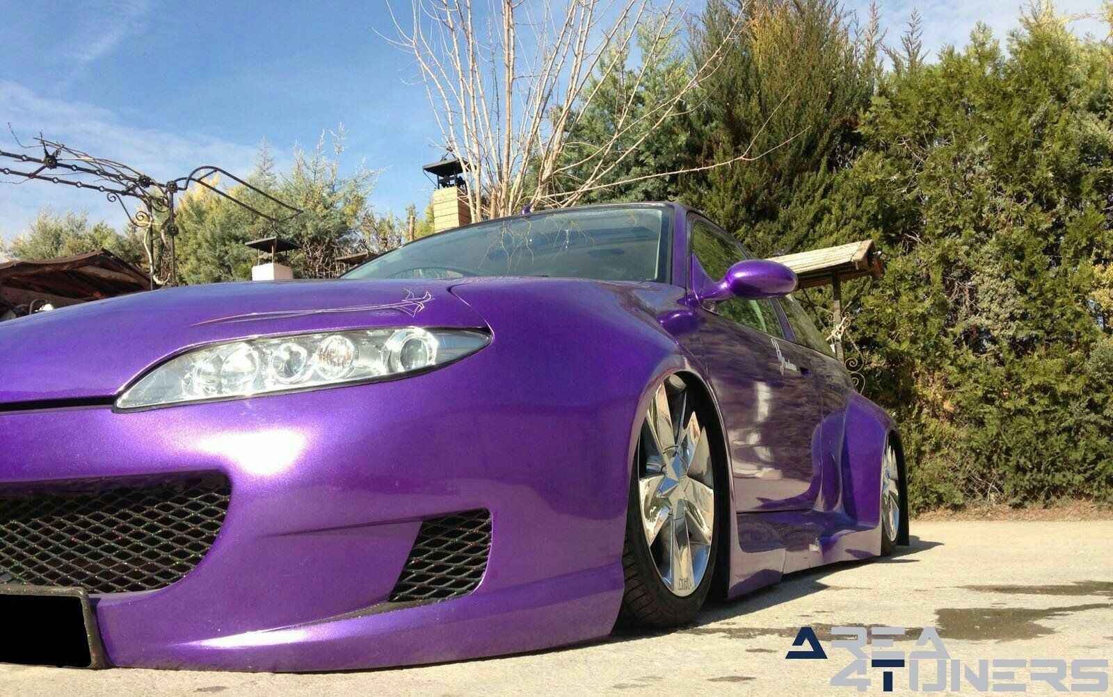 Imagen reportaje coche Tuning Mg Zr Curvas Infinitas Imagen perteneciente al reportaje de coche Tuning, de la revista Area4tuners.es sobre un Mg Zr