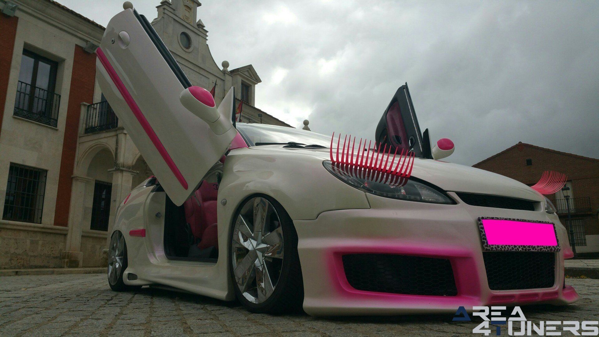 Imagen reportaje coche Tuning Peugeot 206 Mirada Femenina Imagen perteneciente al reportaje fotográfico de la revista Tuning de publicación diaria Area4tuners.es sobre un Peugeot 206