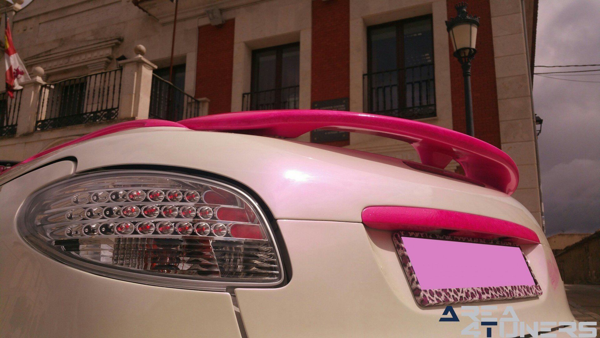 Imagen reportaje coche Tuning Peugeot 206 Mirada Femenina Imagen perteneciente al reportaje fotográfico de la revista Tuning de publicación diaria Area4tuners.es sobre un Peugeot 206